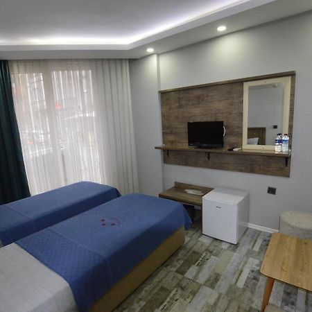Tuem Palace Otel บานเดียร์มา ภายนอก รูปภาพ